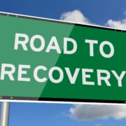 Road to recovery signpost