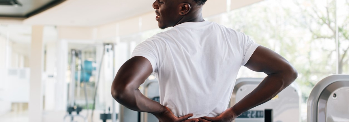 Young man with lower back pain