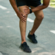 knee pain after sports injury at jogging track,